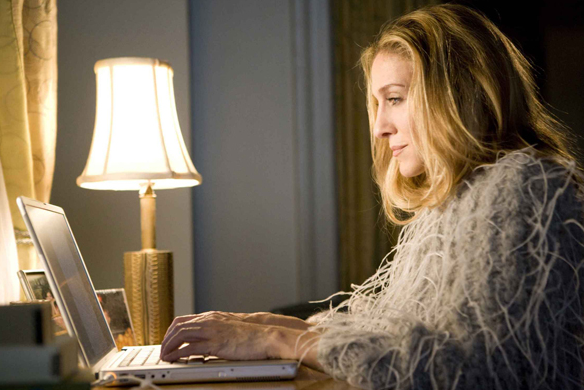 Carrie Bradshaw doing what she does best